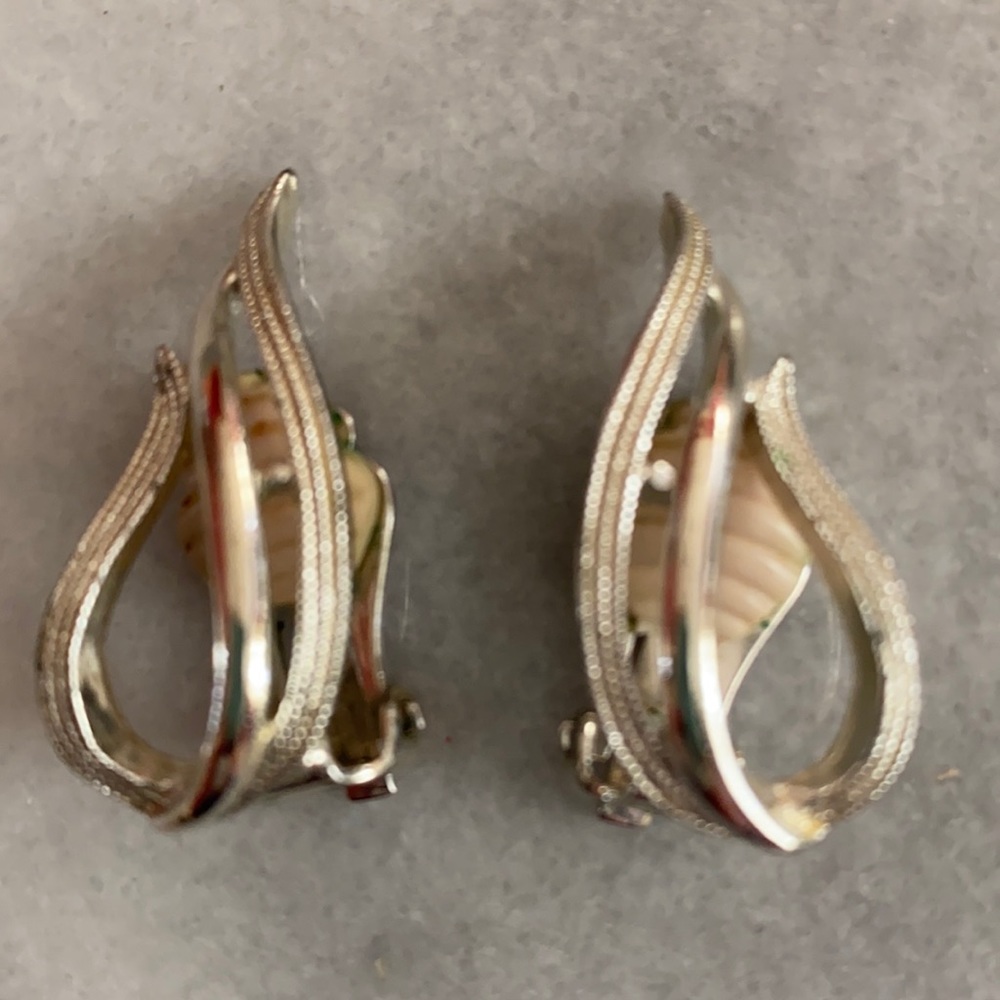 Silver Tone Brushed and Shiny Flame Shaped Clip On Earrings